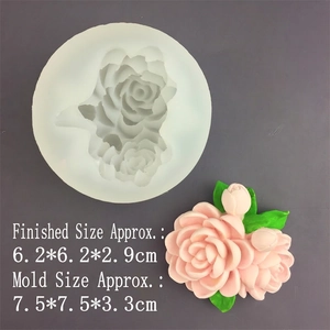 Detailed 3D gardenia silicone mold with a pink floral fondant and green leaf finished product