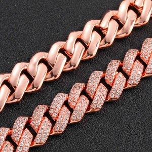 Close-up of 14mm rose gold Cuban link chains with polished finish and micro-pave cubic zirconia
