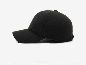 Detail view of coffee wool baseball cap showing thick texture and Fashion metal label