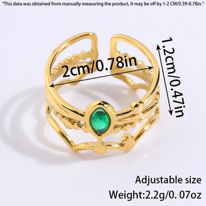 Detail of adjustable gold ring with green oval stone and triple-layered engraved band