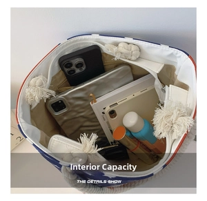Spacious canvas tote bag interior with nautical rope handles and zipper closure