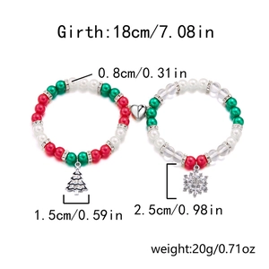 Detailed view of Christmas magnetic bracelets with snowflake and tree pendants and measurements