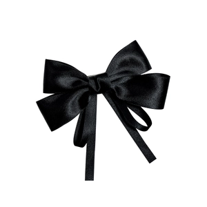 Elegant black satin bow hair clip with glossy finish and minimalist spring clasp design