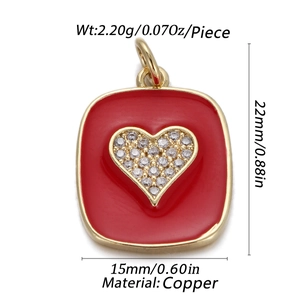 Detail of gold copper square pendant with red enamel heart and zircon showing dimensions