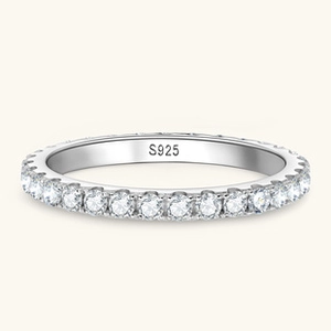 Macro detail of S925 sterling silver ring featuring a full circle of pavé moissanite stones