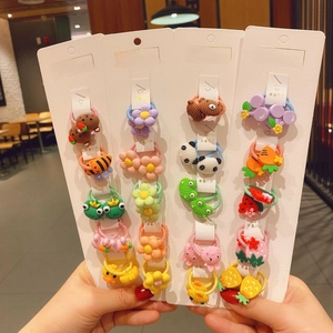 Detailed set of colorful cartoon hair ties with resin fruit and animal charms