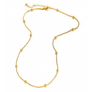 Minimalist gold beaded snake chain necklace for women featuring polished round beads