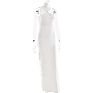 Detailed view of white halter dress featuring elegant gold metal clasp on the neckline