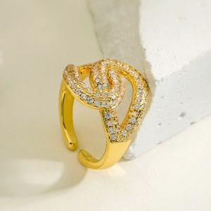 Elegant 18K gold-plated interlocking geometric open ring with sparkling cubic zirconia