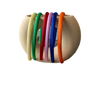 Set of six colorful satin headbands in bright candy colors for women and girls