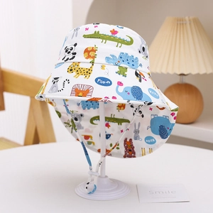 Close-up of kids sun hat featuring colorful animal prints and adjustable windproof cord