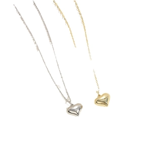 Minimalist metallic heart pendant choker necklace in polished gold and silver finish