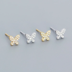 Sparkling butterfly stud earrings in gold and silver finish with pavé set crystals