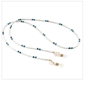 Detail of beaded eyewear chain with blue black pearls and silicone anti-slip loops