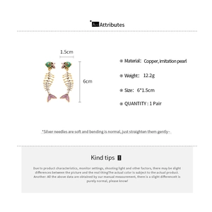 Detail showing dimensions of fishbone earrings with brass base and colorful enamel finish