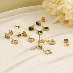 Elegant 18K gold plated heart zircon earrings set on silk background for women