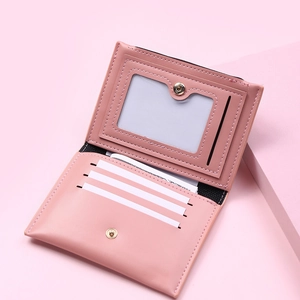 Detail of pink PU leather short wallet showing card slots and transparent photo window