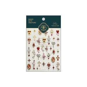 Gothic 3D embossed nail stickers featuring gold angels and red hearts on white background