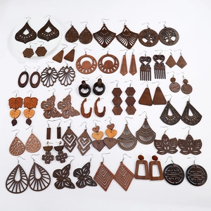 Set of 34 pairs of vintage hollow wooden earrings in geometric and natural patterns