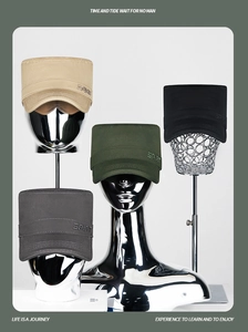 Detail of army cadet hats with SPIRIT embroidery in khaki, black, green and grey
