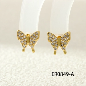 Detail of gold butterfly stud earrings with micro-pave white zircon on clear display stands