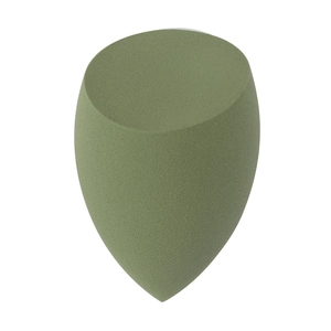 Detail of olive green makeup sponge with flat edge teardrop shape on white background