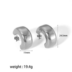 Detailed view of silver C-shape earrings with dimensions 24.5mm height and 19.4g weight