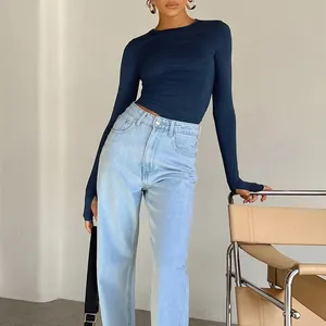 Slim fit dark blue long sleeve top paired with high waist denim jeans outfit set