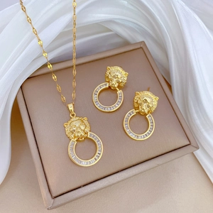 Luxurious gold lion head jewelry set with sparkling zircon necklace and earrings in a box