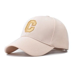 Detail of the high-quality 3D embroidered C letter on the pink baseball cap fabric