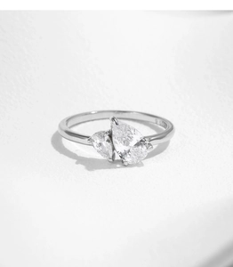 Detailed macro shot of the S925 sterling silver stamp on a pear-cut stone ring