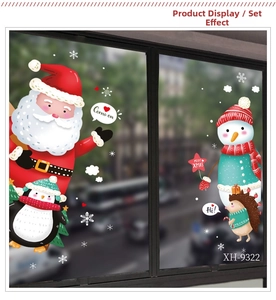 Festive Christmas window decals featuring Santa, snowman, and snowflakes on a clear pane