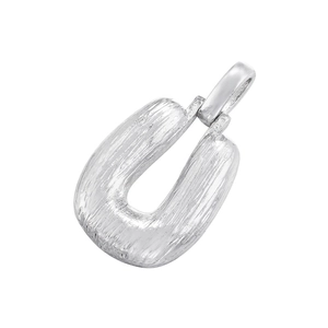 Macro detail of silver U-shaped pendant featuring a unique brushed metallic texture