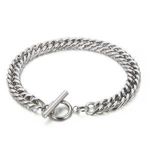 Men's silver titanium steel curb chain bracelet with OT toggle clasp on white background
