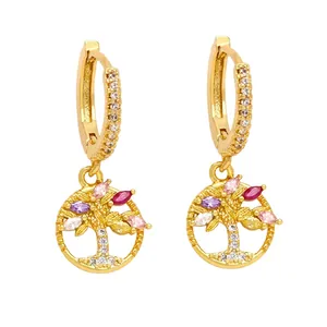 Golden Tree of Life huggie earrings with colorful zircon stones on white background