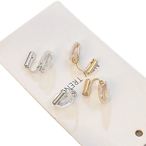 Minimalist U-shaped earring converter set in gold and silver with silicone pads
