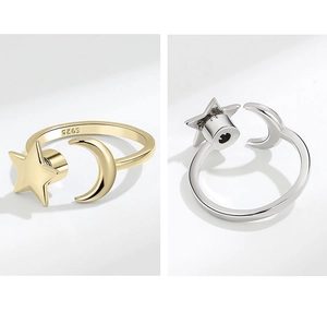 Detailed macro view of gold and silver S925 star and moon rotating open rings