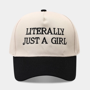 Two-tone cotton baseball cap in cream and black featuring embroidered slogan detail