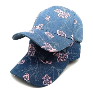 Embroidered denim baseball caps in light and dark blue with pink floral patches