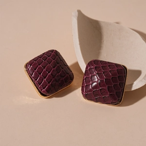 Retro square faux leather stud earrings with purple snakeskin texture and gold trim