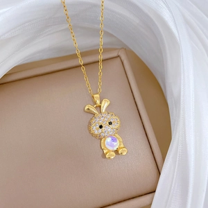 Elegant gold titanium steel necklace with a crystal-studded rabbit pendant for women