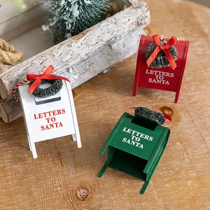 Set of three vintage metal Christmas mailboxes with Santa letters and wreaths