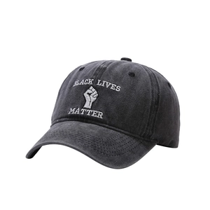Washed dark gray cotton baseball cap featuring Black Lives Matter embroidery and curved brim