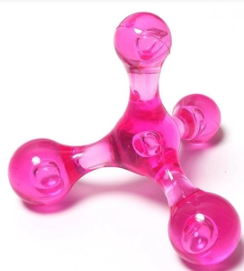 Pink transparent plastic 4-point muscle massager tool with ergonomic handheld grip design