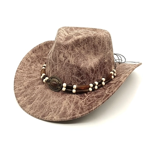 Vintage faux suede western cowboy hat with cracked texture and ethnic beaded band decor