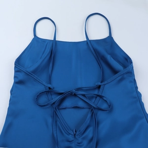 Detailed view of royal blue satin evening dress featuring back lace-up and hidden zipper
