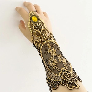 Gothic black lace arm cuff bracelet with gold rings and yellow teardrop gemstone accents