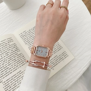 Rose gold rectangular quartz watch set with geometric diamond bracelet and slim rings