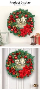 Detailed Christmas wreath featuring gold Merry Christmas sign, red poinsettias and pine cones