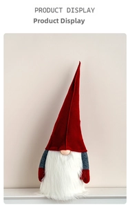 Close-up of a festive Christmas gnome with a red cone hat and white plush beard